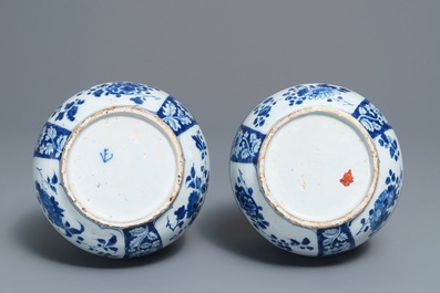 A pair of Dutch Delft blue and white double gourd chinoiserie vases, 18th C.